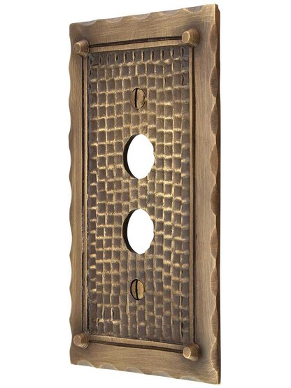 Bungalow Style Single Push Button Switch Plate In Antique Brass.